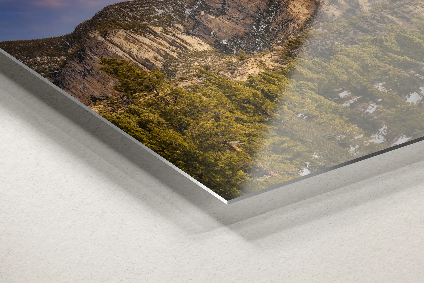 A detailed view of the metal print's edge, displaying Fletcher Peak at Mt Charleston, symbolizing the durable elegance and reflective vibrancy of the art piece.