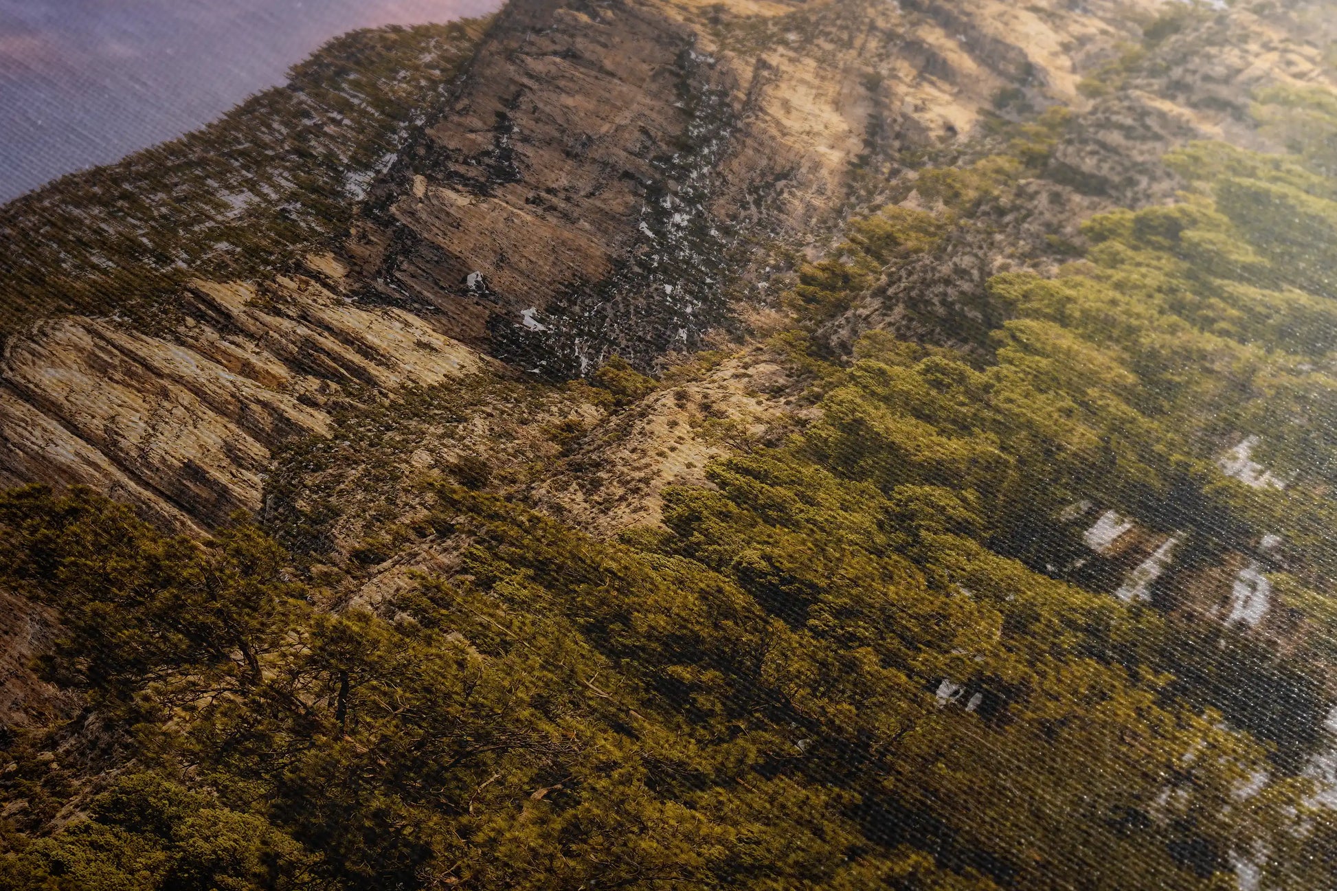 Close-up of a canvas print texture featuring the rugged landscape of Fletcher Peak at Mt Charleston, symbolizing the detailed beauty of natural art.