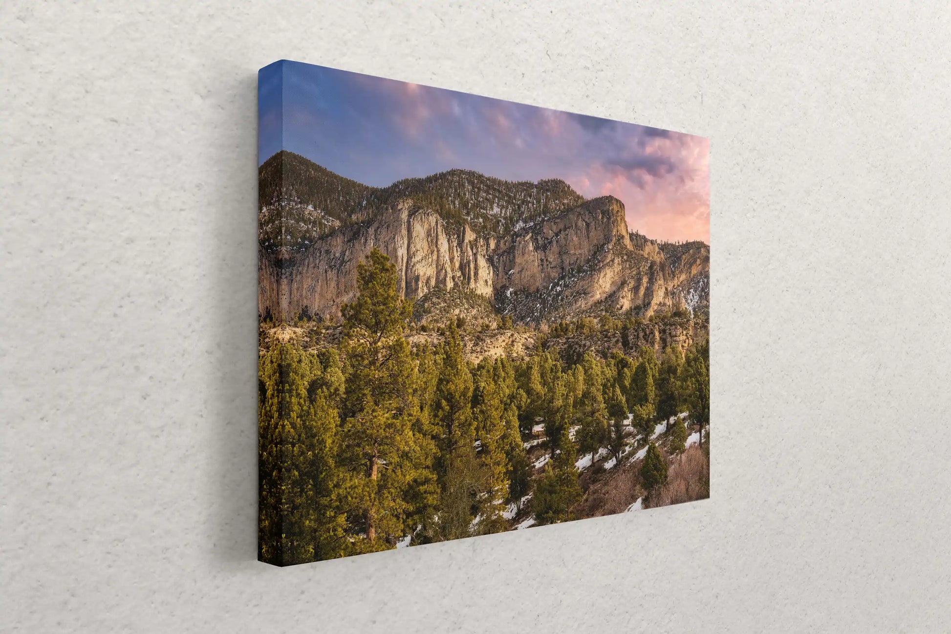 Side view of a canvas print on a wall, depicting Fletcher Peak at Mt Charleston, blending nature's grandeur with a touch of artistic serenity.