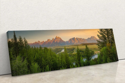 Side view of panoramic canvas art featuring a sunrise over the Teton Mountains and Snake River.