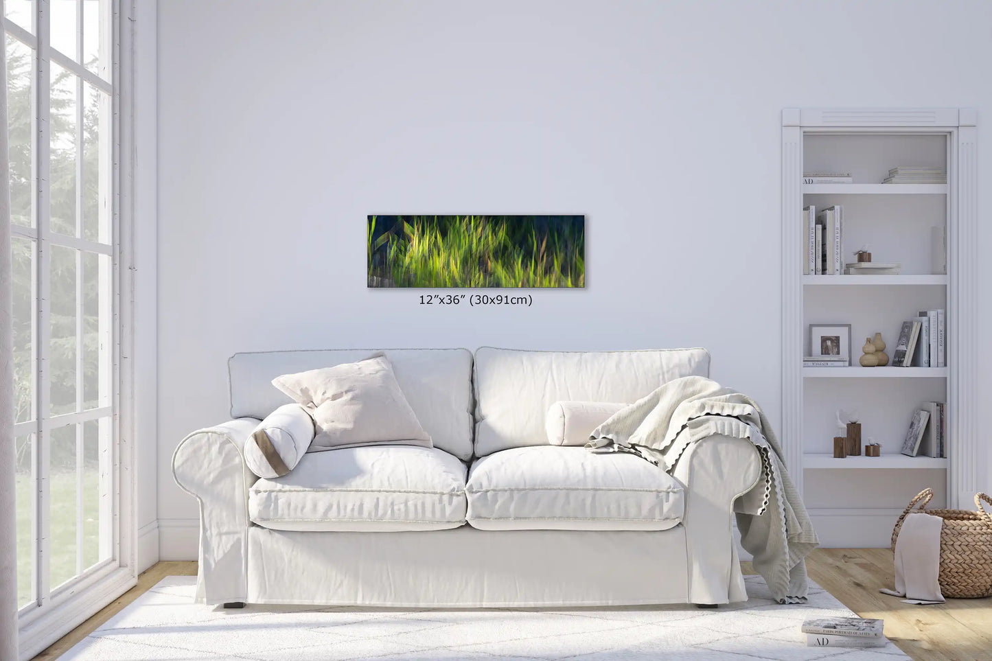 Wall art of green abstract strokes, sized 12"x36", creates a lively contrast above a white couch, adding a touch of nature-inspired movement to the living room.