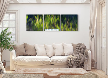 Three-piece wall art set in a living room, each featuring green abstract designs sized at 24"x72", creating a continuous visual flow and a statement wall.