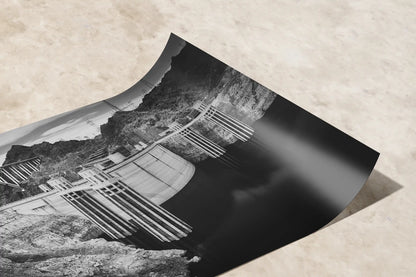 Close-up view of a premium paper print of Hoover Dam in black and white, detailing the texture and contrast of the print medium.