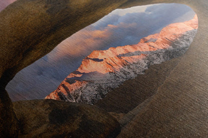 Textured canvas detail accentuates the interplay of shadow and light over Lone Pine Peak, as seen through Mobius Arch, inspiring a meditative connection with nature.