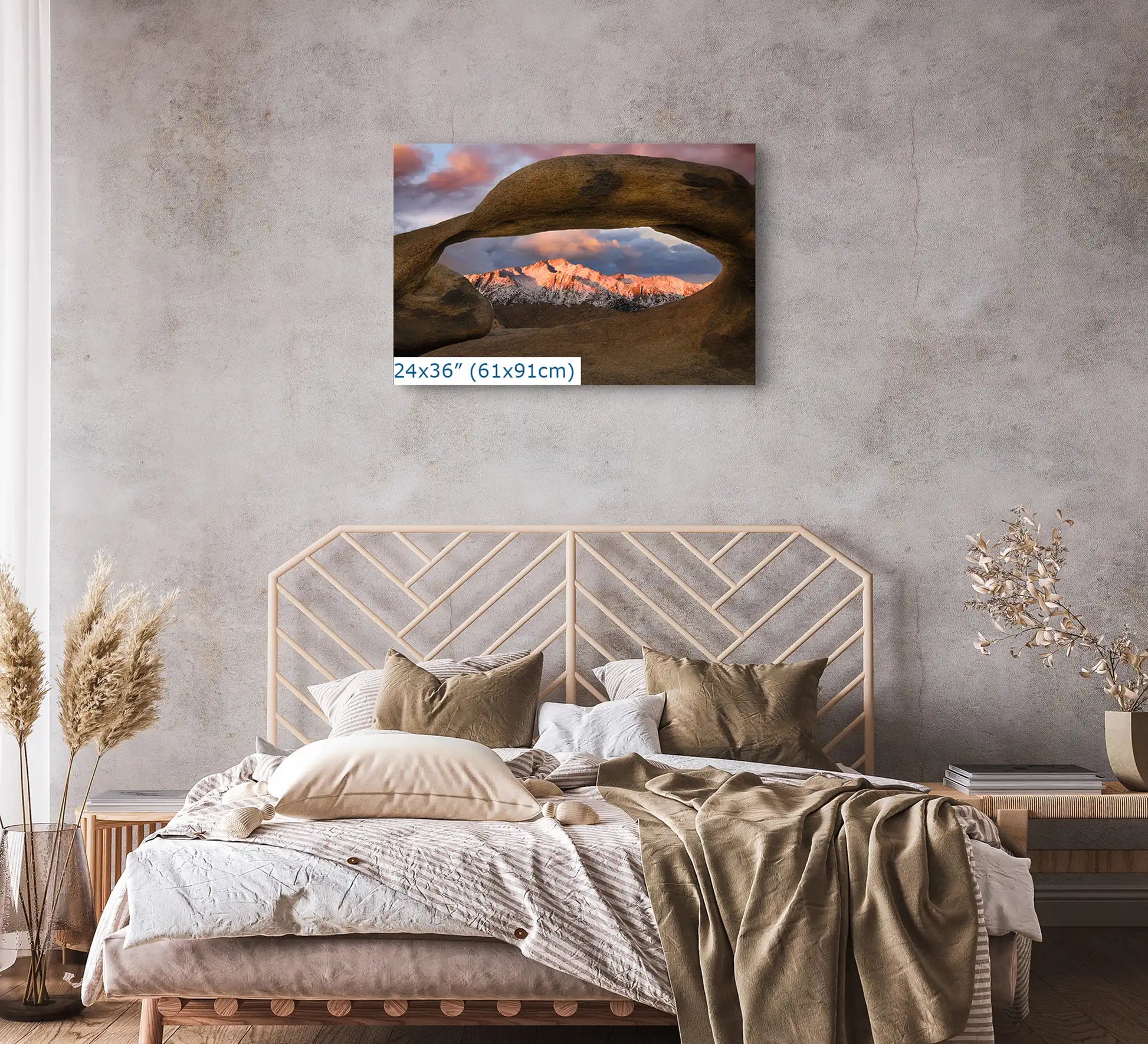 Large 24x36 canvas print of Lone Pine Peak through Mobius Arch adding tranquility to a modern bedroom.