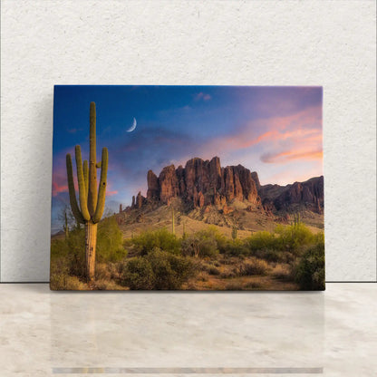 Vibrant canvas print depicting a Saguaro Cactus at sunset in Superstition Mountains, Arizona, leaning against a wall, inviting desert beauty into your home.