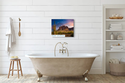 A 16x20 canvas print of a Saguaro Cactus Sunset at Arizona's Superstition Mountains, enhancing the tranquility of a bathroom setting.