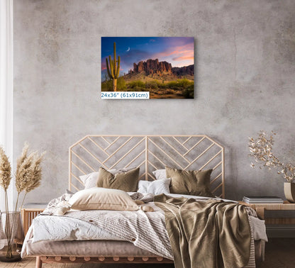 A 24x36 canvas, capturing the tranquil Saguaro Cactus Sunset at Superstition Mountains, Arizona, creates a peaceful bedroom retreat.
