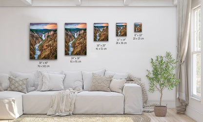 A variety of canvas sizes displayed in a living room, all featuring a wide view of Lower Yellowstone Falls at sunset, providing decor options.