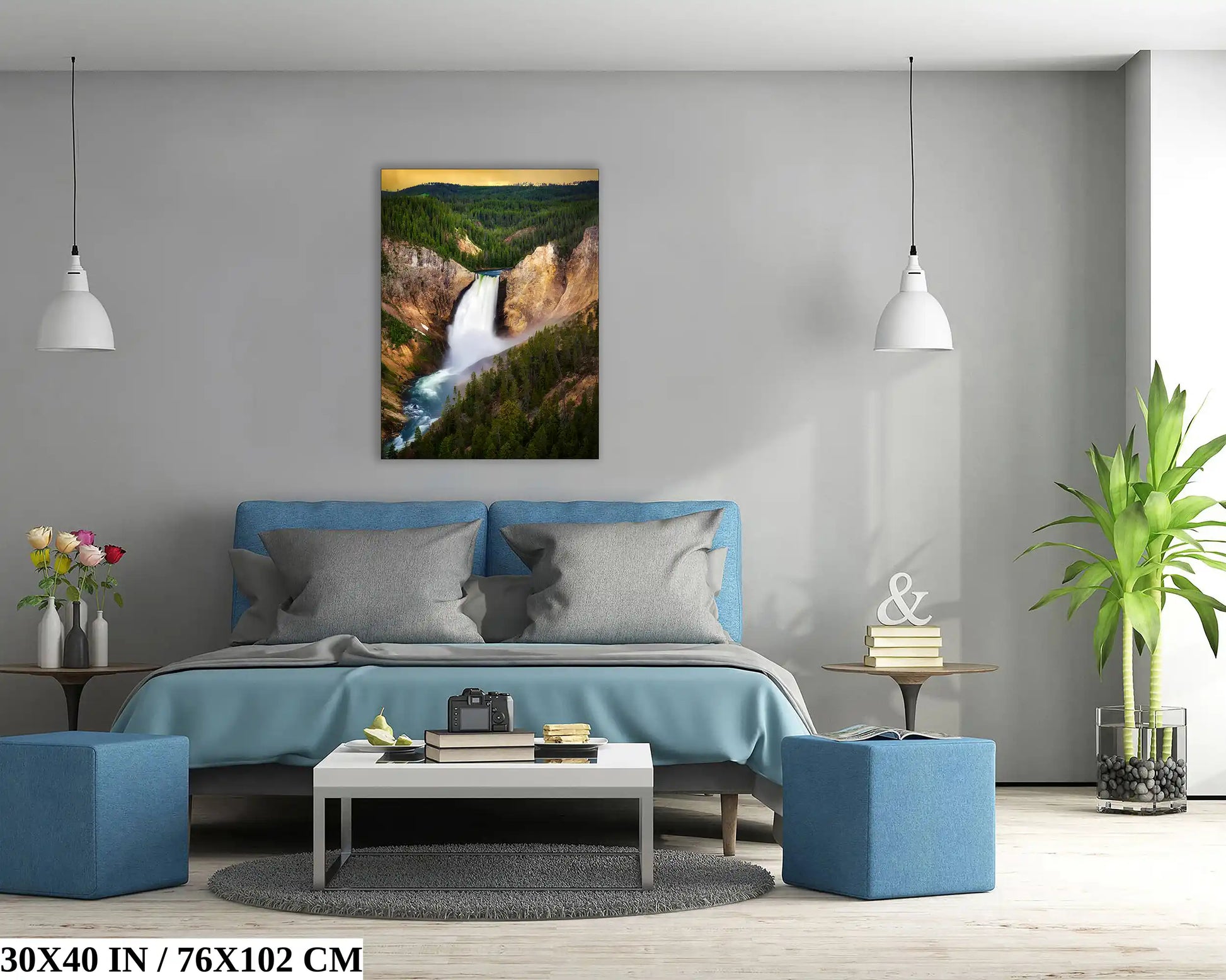 A 30x40 inch canvas print of Lower Yellowstone Falls at sunset in a bedroom setting, creating a serene wall feature.