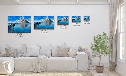 Gallery of canvas prints showing Morro Rock through the perspective of a boat's bow, marrying coastal beauty with the tranquility of the sea.