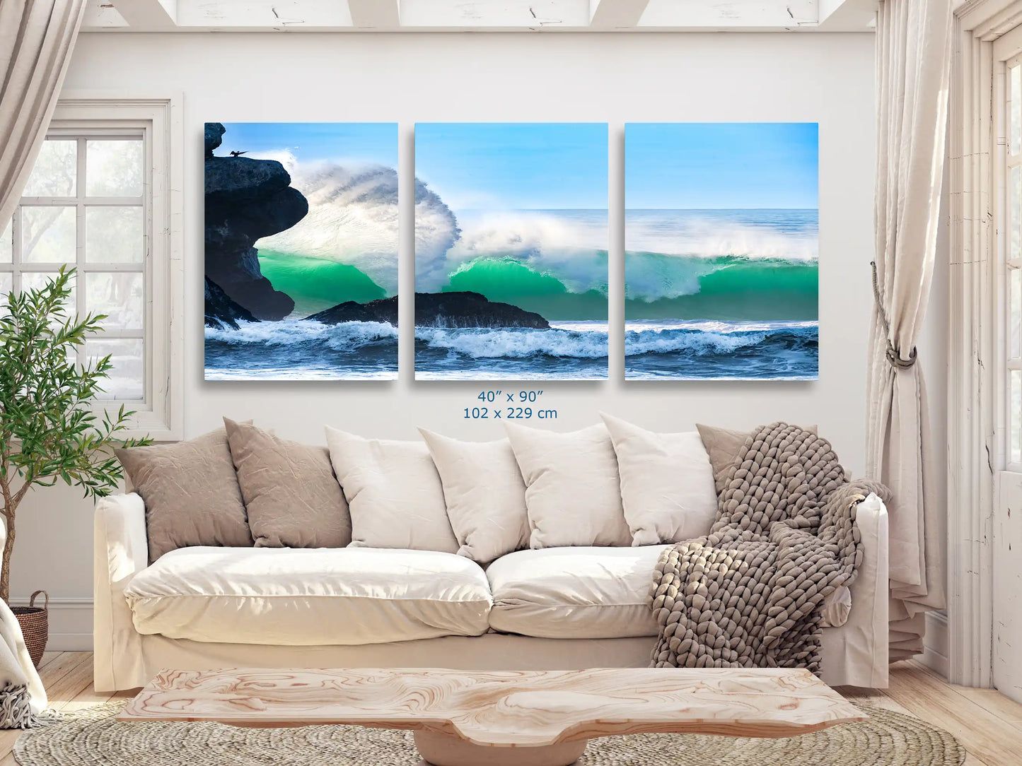 A 40"x90" expansive wall art piece capturing the grandeur of Morro Rock's ocean waves, dominating the living room's visual space.