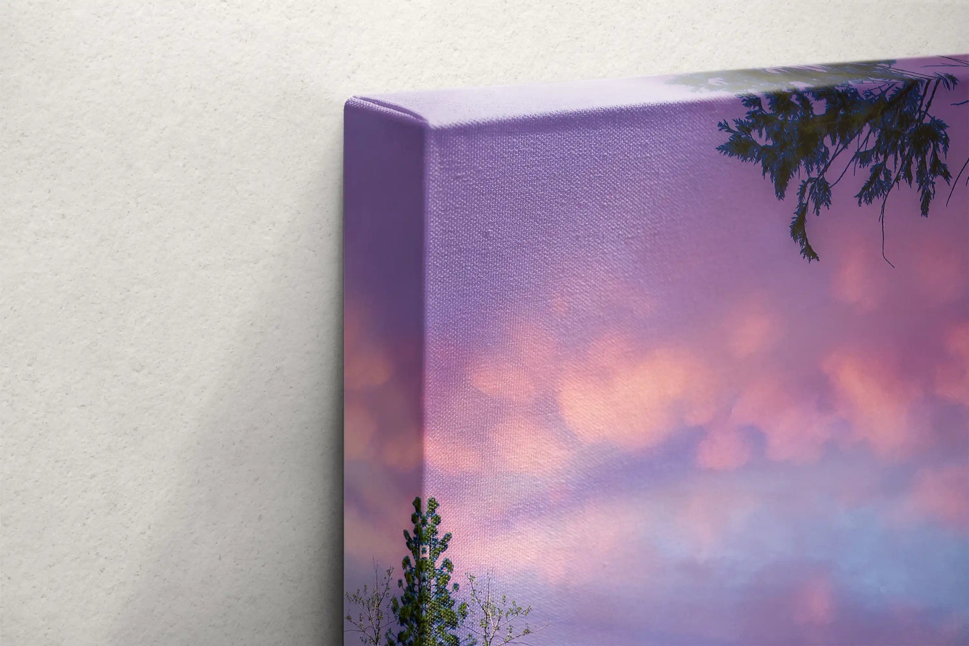 Edge view of a canvas print featuring the pink twilight skies of Yosemite's Mt. Watkins and Mirror Lake.