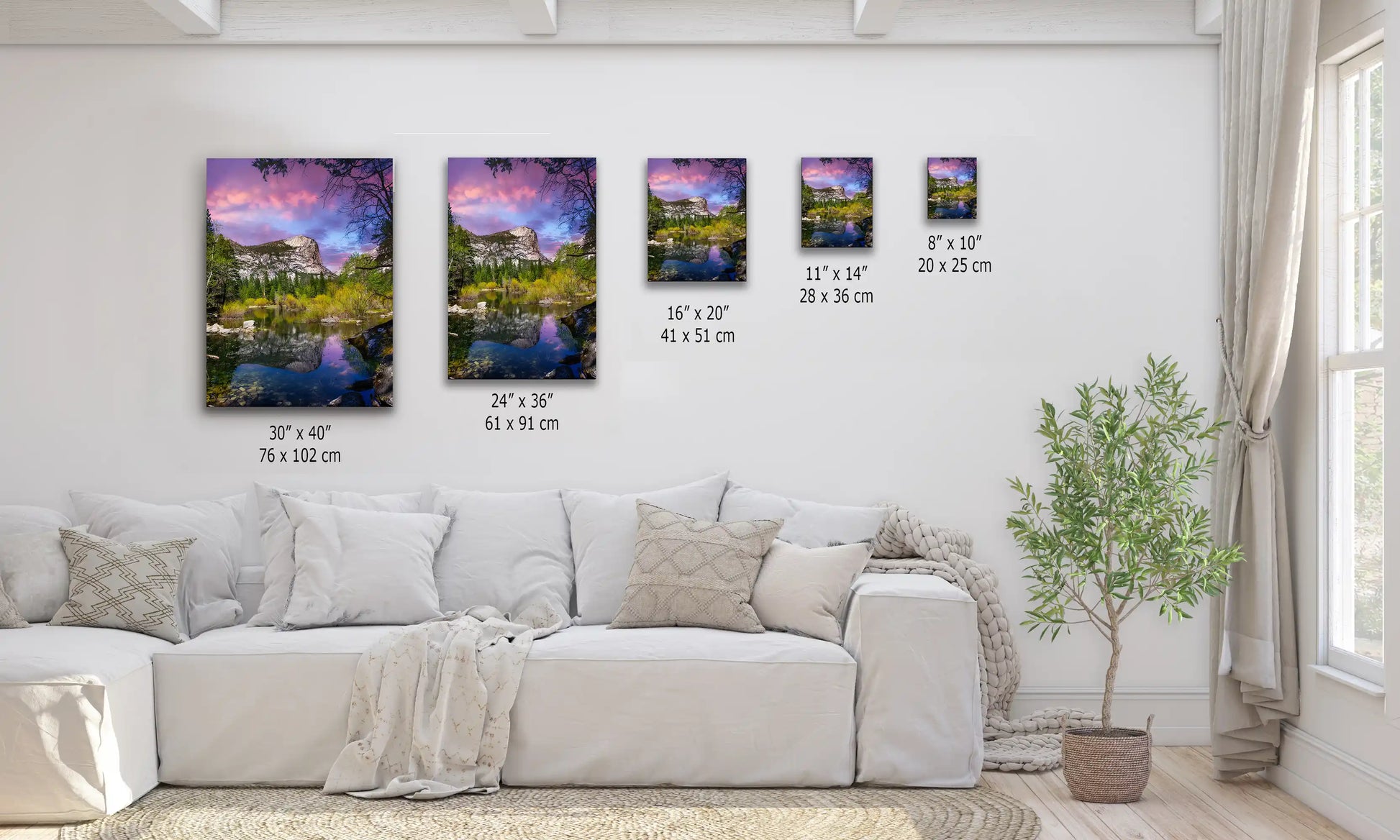 Assorted sizes of Mt. Watkins and Mirror Lake canvas prints on a living room wall, depicting peaceful Yosemite scenery.