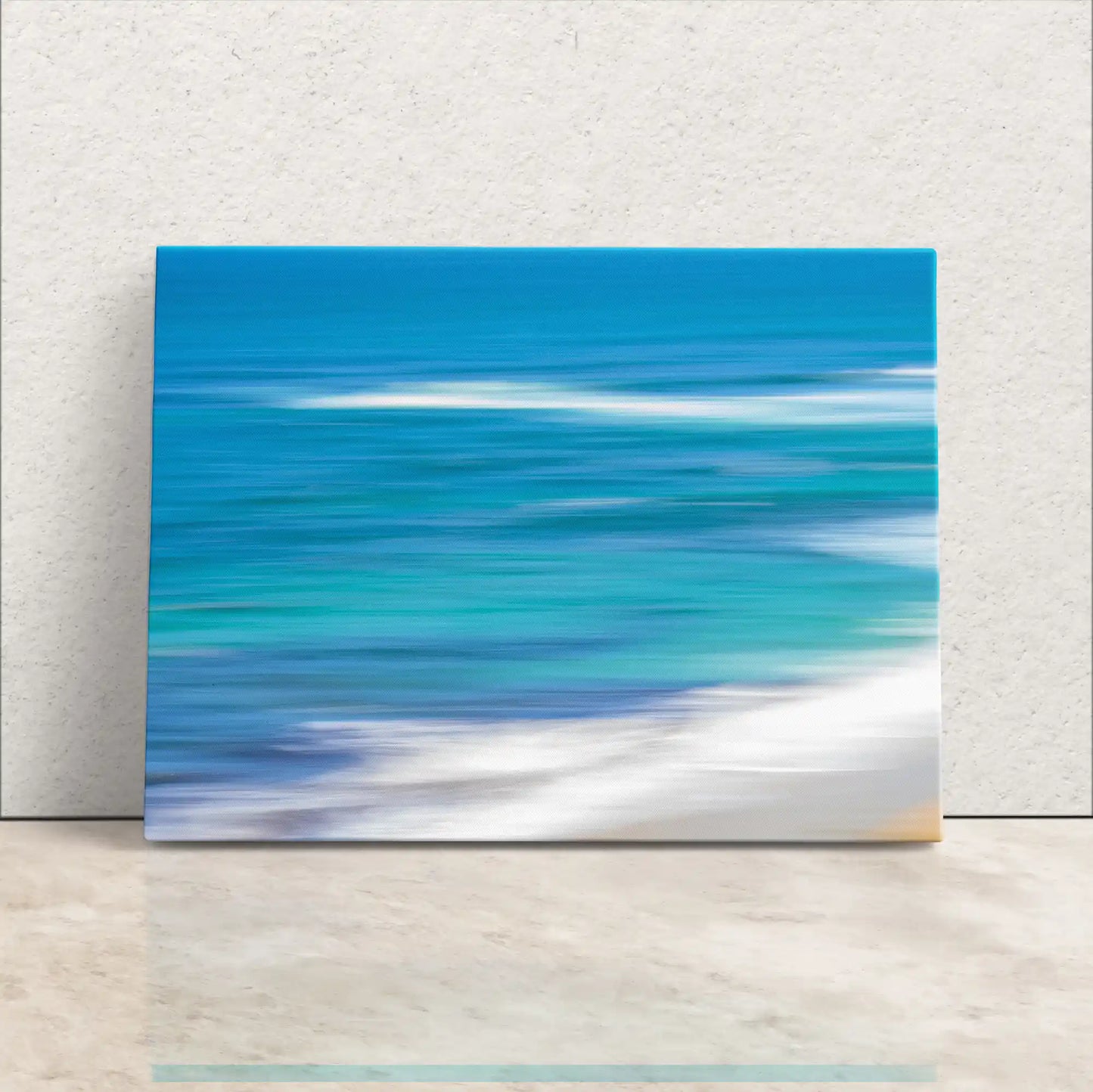 Blue Ocean abstract art on canvas leaning against wall