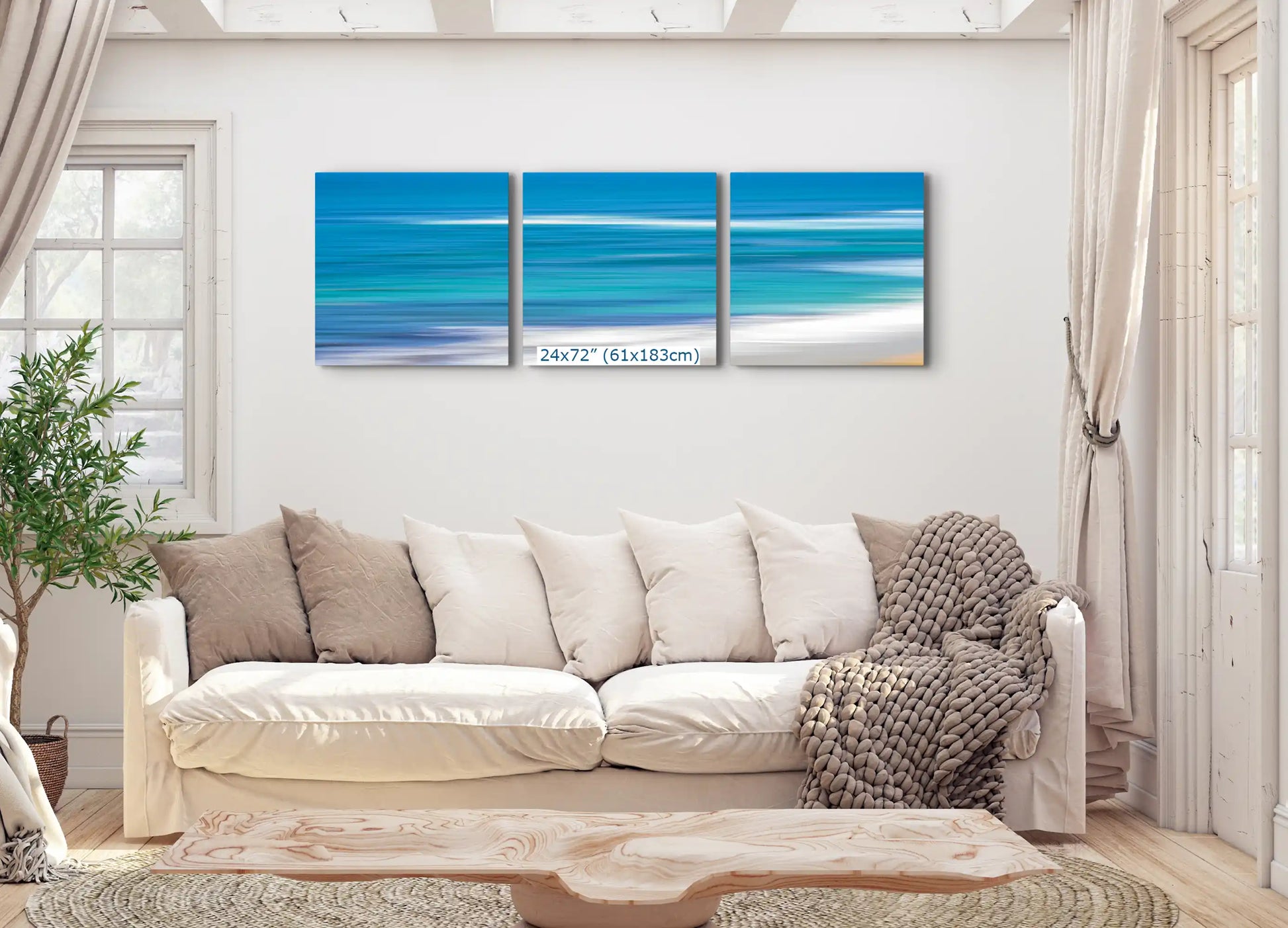 Blue Ocean abstract art in 3-piece canvas 24x72-inches over living room couch