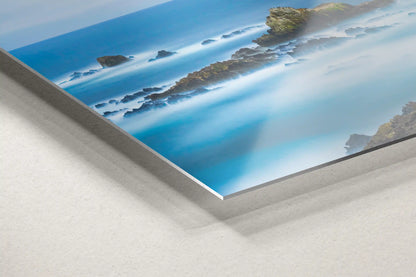 Detail of Point Lobos seascape on metal decor, highlighting the glossy finish and vibrant colors of the ocean scene.