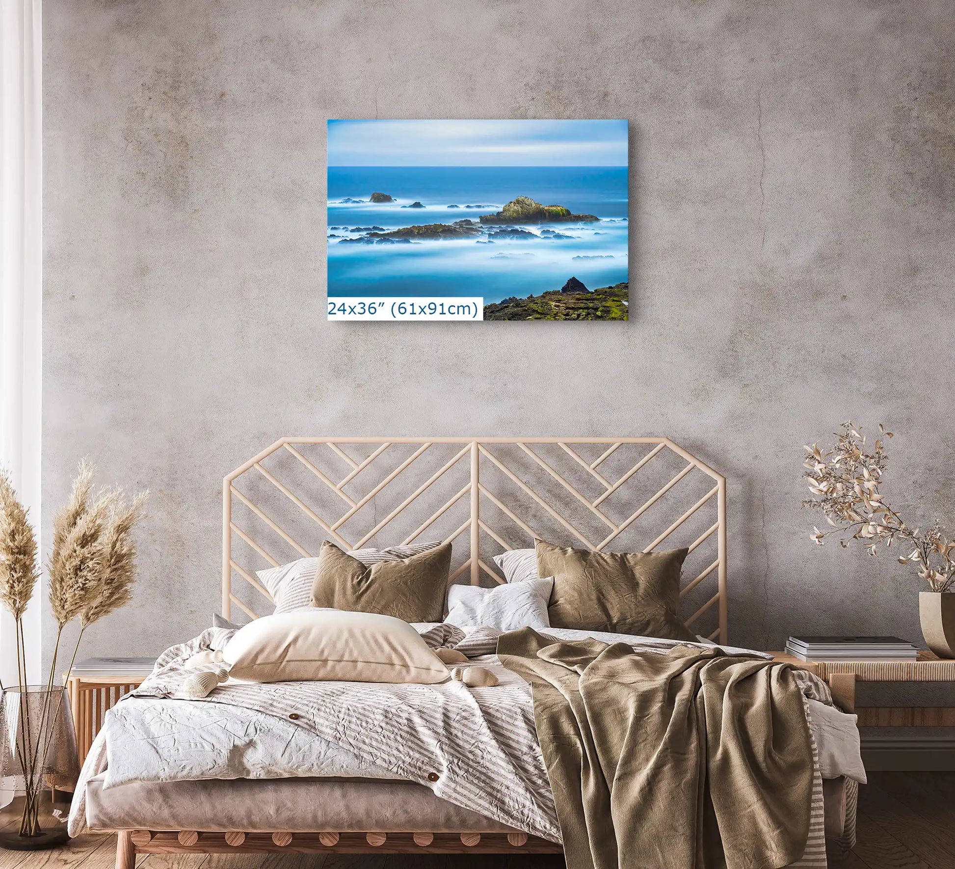 Point Lobos seascape in 24"x36" size, creating a peaceful backdrop above a bed, merging nature with restful decor.
