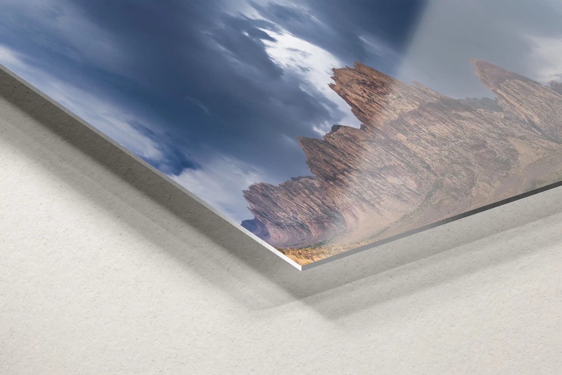 Close-up of the edge of a metal print of the Red Rock Canyon, highlighting the print's sleek and modern finish.