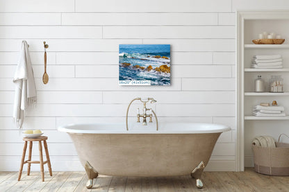 The ocean scene canvas, sized 16"x20", hung on a white shiplap wall above a freestanding bathtub.