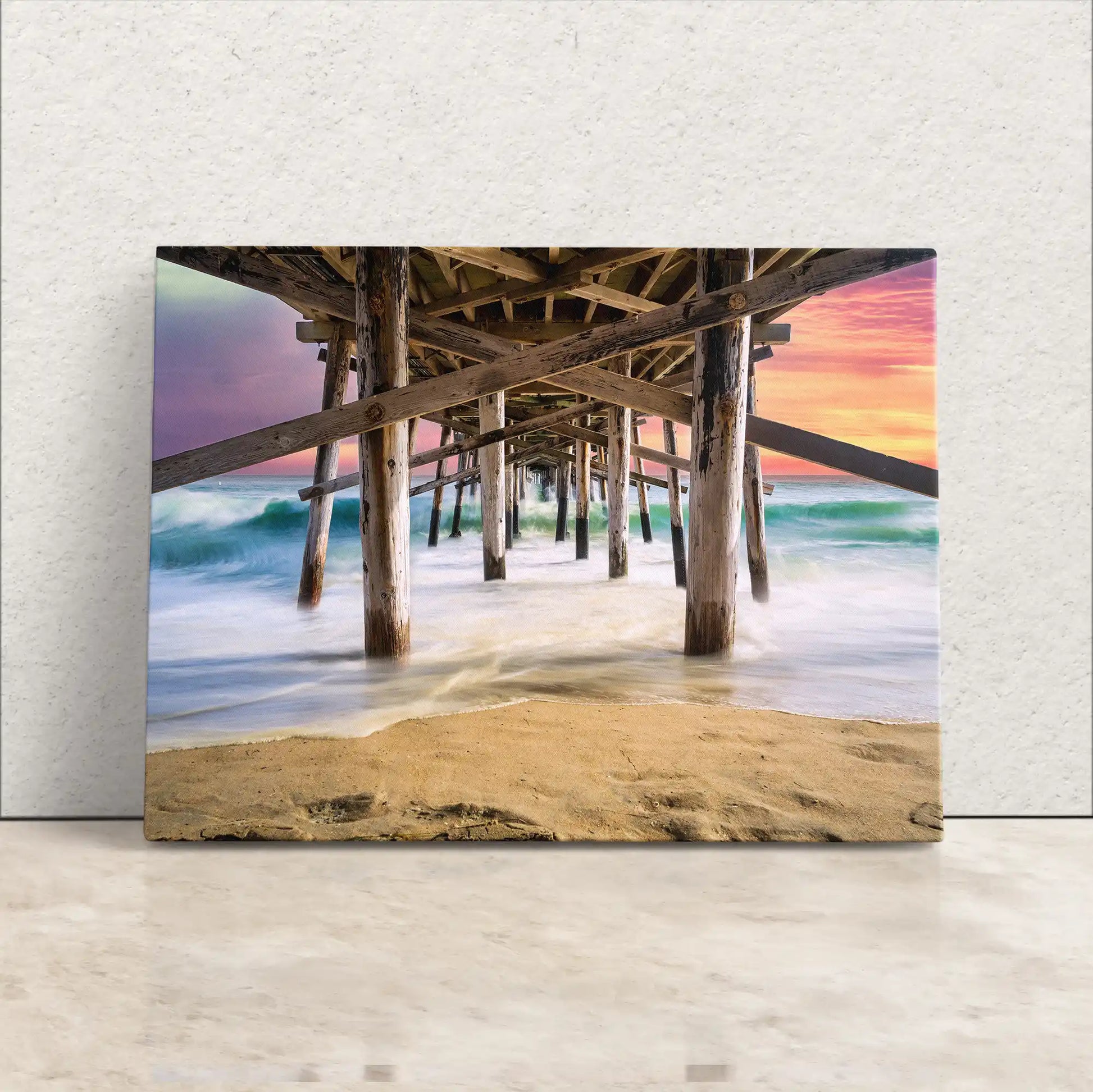 Frontal view of canvas wall art, capturing the tranquil sunset under Balboa Pier with waves gently lapping the shore.