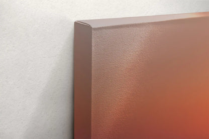 Detailed view of the canvas edge with a warm sunset glow from Ventura Beach sunset artwork, displaying the smooth wrap and color continuation.