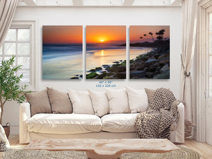 Expansive 40"x90" canvas art of Ventura Beach sunset, serving as a breathtaking focal point in a spacious living room setting.