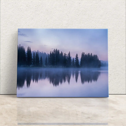 Sleek wall art showcasing Yellowstone Lake's forest reflection at twilight, with a modern, frameless design and vibrant hues.