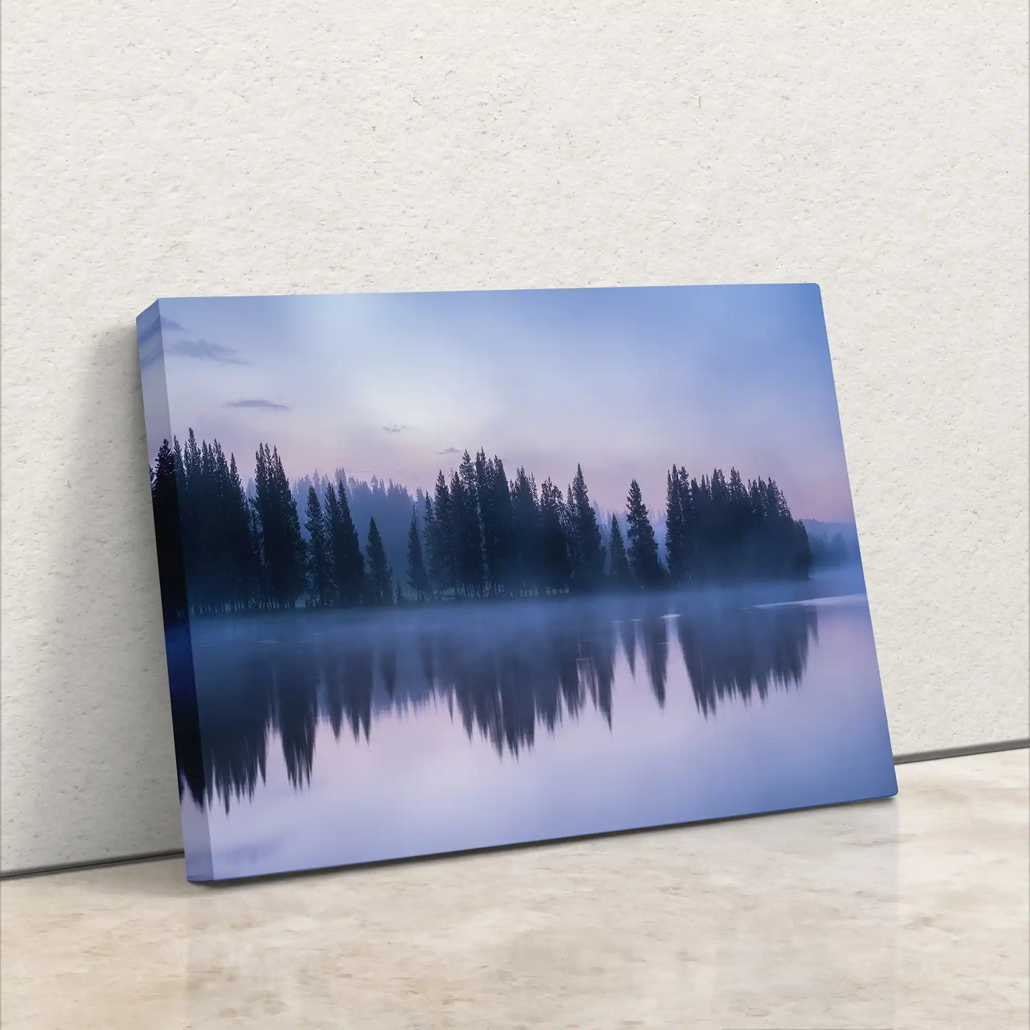 Side angle of a canvas print, illustrating the depth of the image featuring Yellowstone Lake's tranquil waters reflecting the twilight forest.