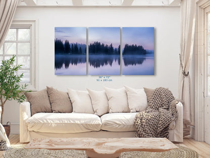 Oversized three-panel wall art, each 36x72, featuring Yellowstone Lake's twilight reflection, creating a dramatic visual impact in a spacious living room.