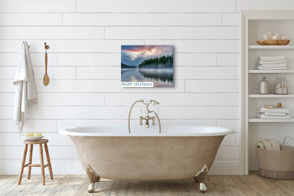 16x20 print of Yellowstone Lake sunrise reflection over a serene forest, hanging in a modern bathroom.