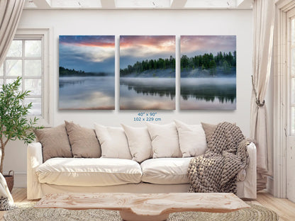 Impressive 40x90 triptych panoramic canvas artwork showcasing the reflective beauty of Yellowstone Lake at sunrise in a living room.