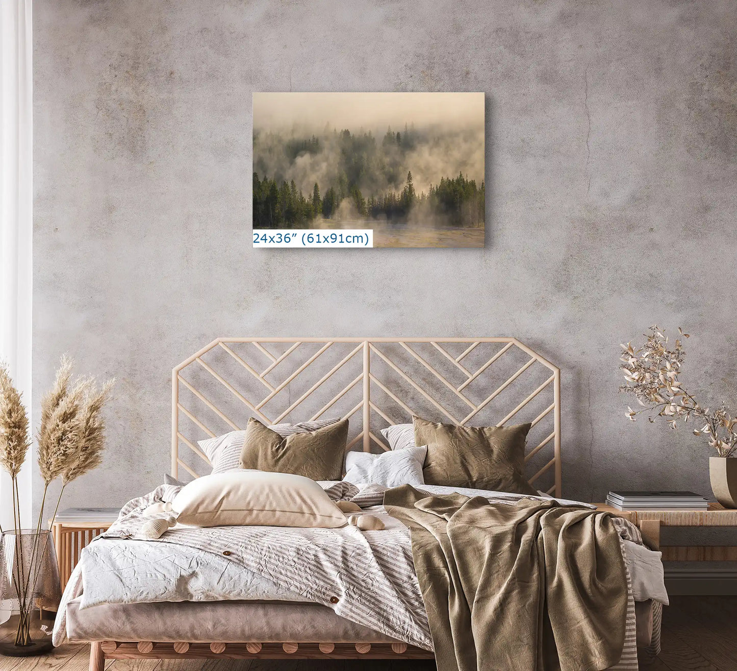 24x36 canvas print of a misty forest in Yellowstone above a bed, adding a peaceful natural scene to the bedroom decor.
