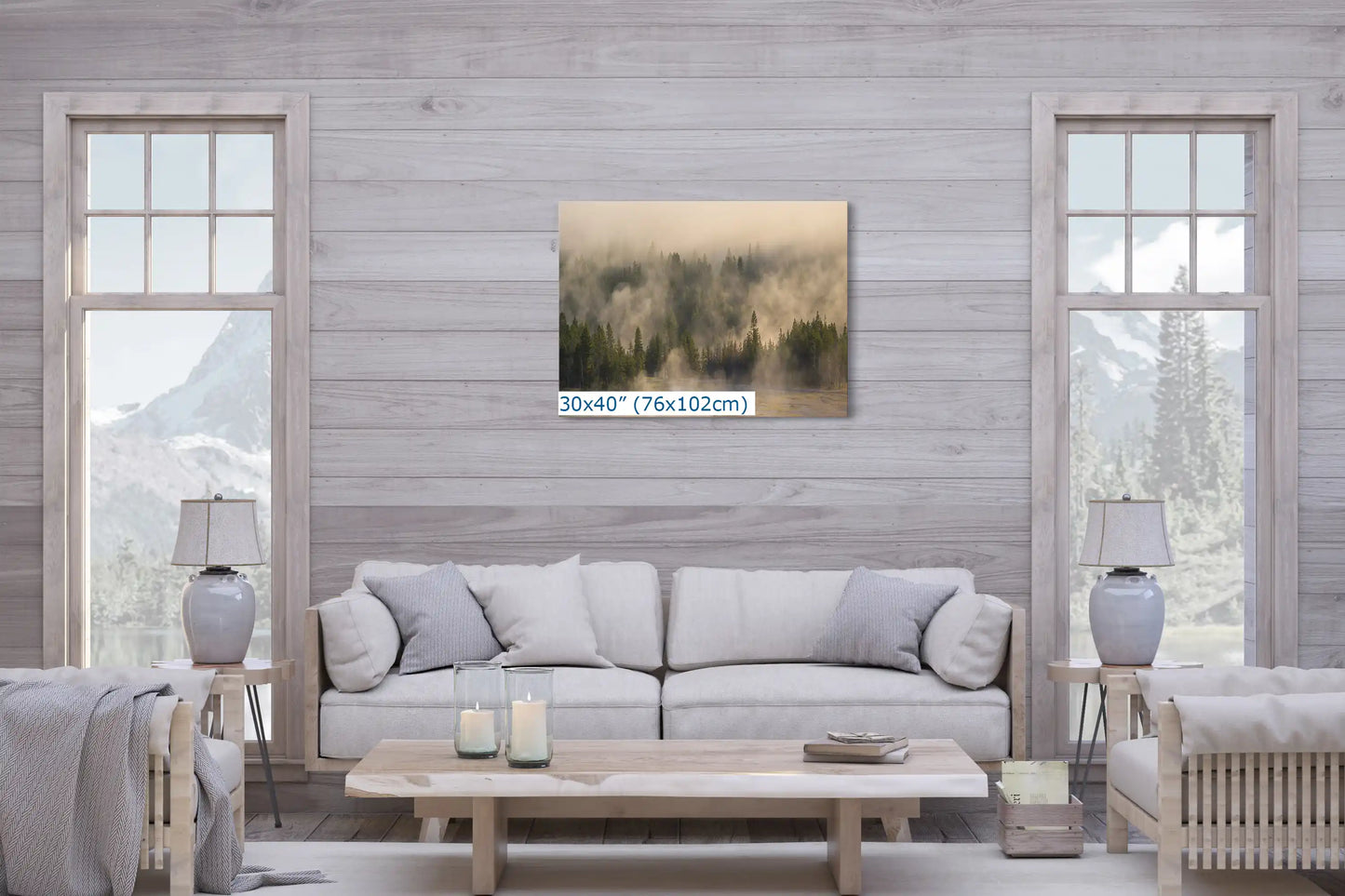 A 30x40 canvas print of Yellowstone's foggy forest in a cozy living room setting, ideal for creating a calming ambiance.