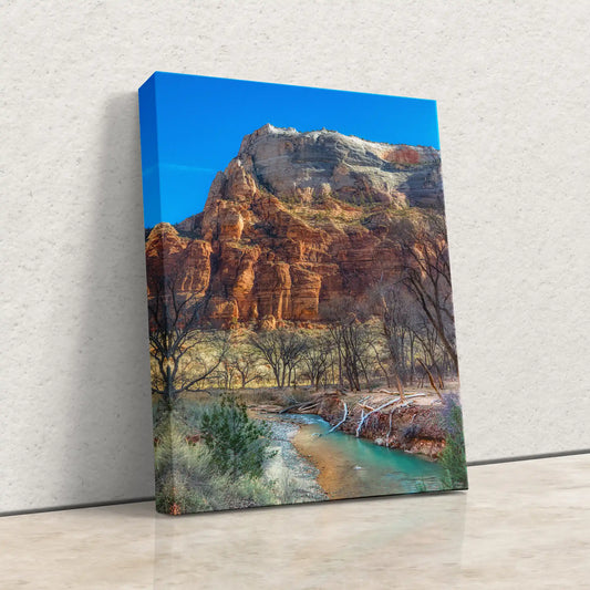 Close-up of the canvas texture and blue edges of a Zion Mountain wall art print, highlighting the print quality.