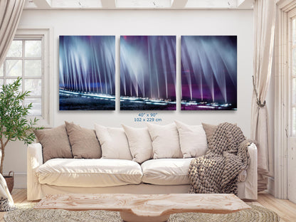 40x90 inch triptych abstract Bellagio fountains wall art displayed in a modern living room.