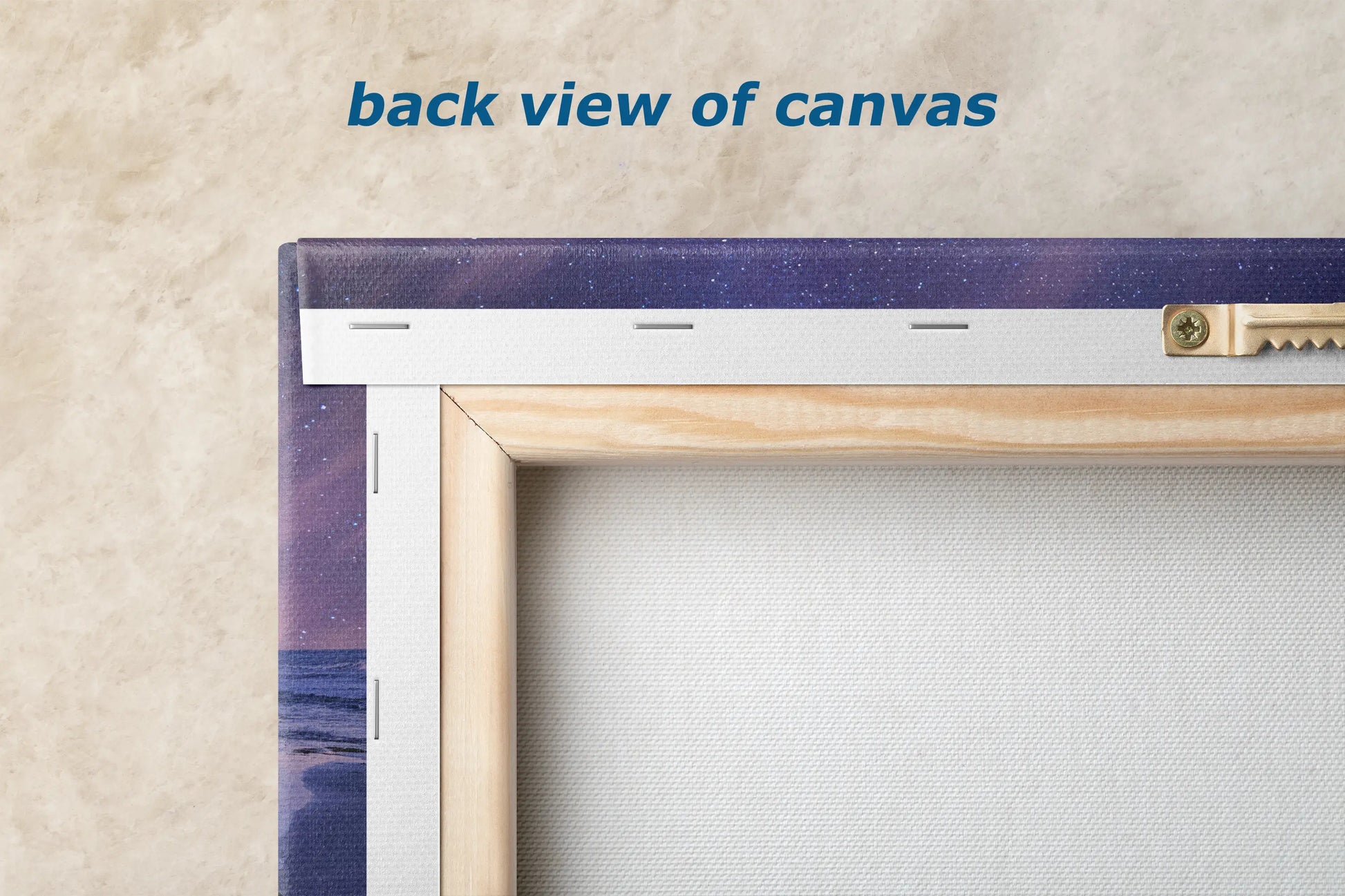 the back view of a canvas with a wooden frame