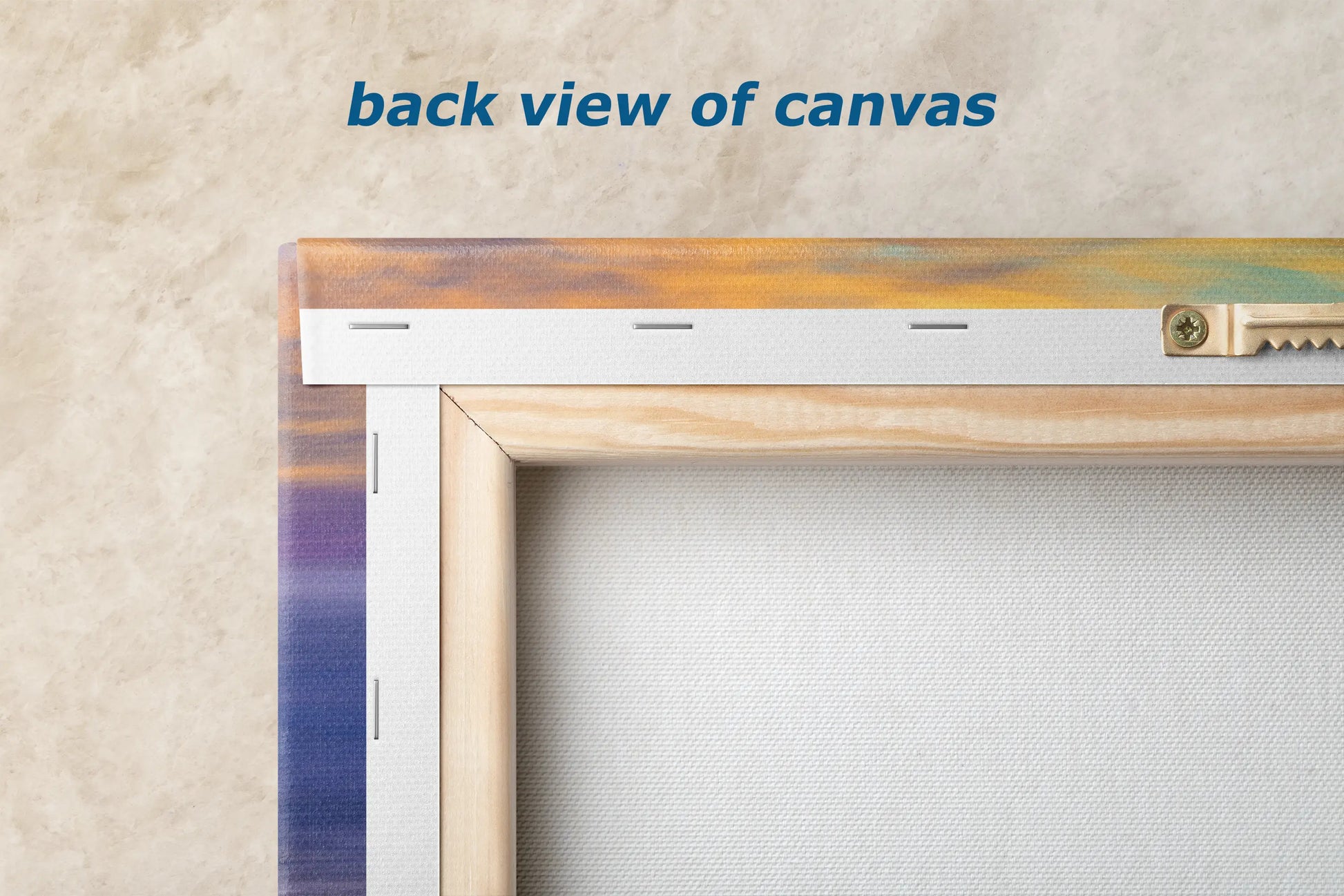 the back view of canvass is shown with a wooden frame