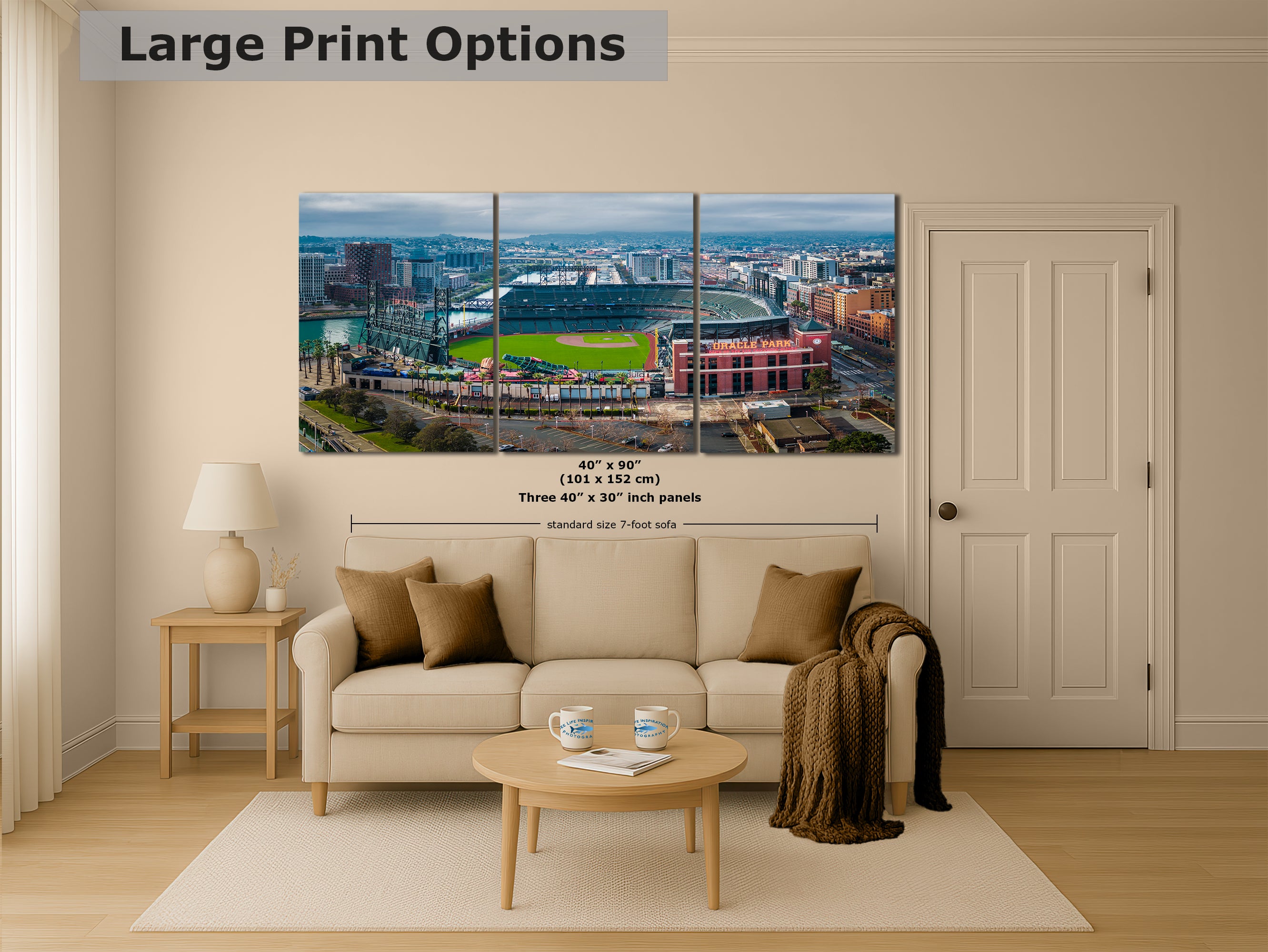 A large, three-panel print depicting a cityscape with a baseball field in the foreground.