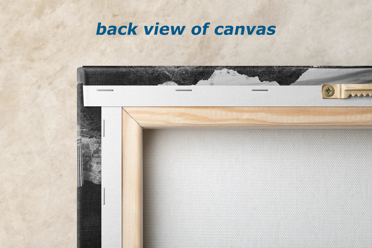 the back view of canvass is shown with a wooden frame