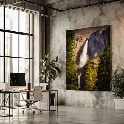 Modern office featuring a large metal print of Yosemite Falls at sunset, positioned to catch the eye and enhance the workspace ambiance.